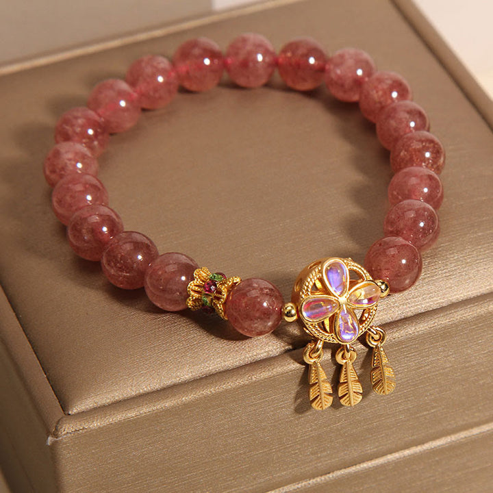 Braccialetto con ciondolo acchiappasogni a forma di quadrifoglio naturale con Buddha Stones e quarzo fragola