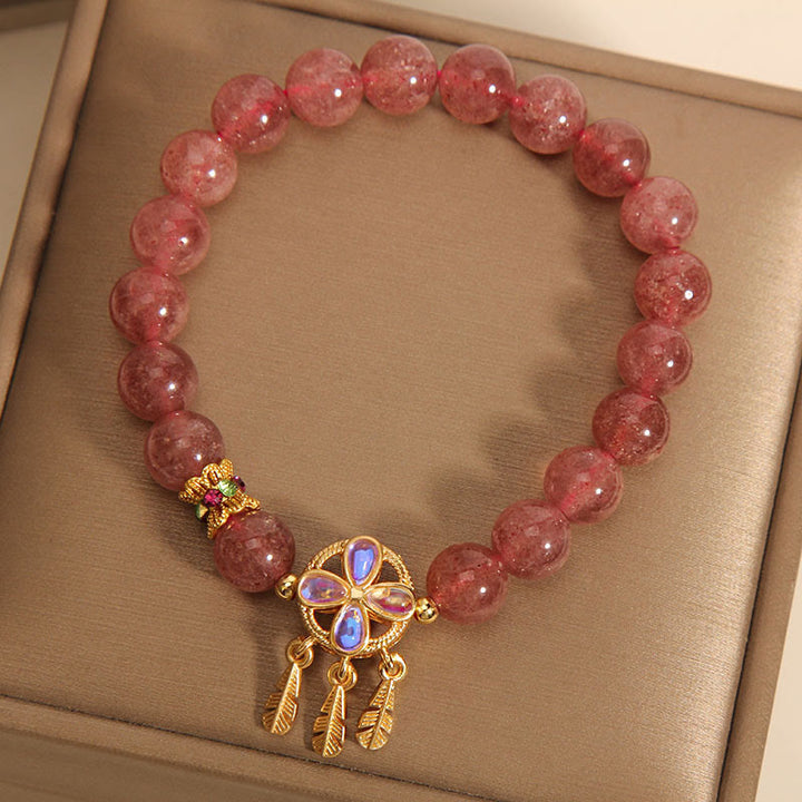 Braccialetto con ciondolo acchiappasogni a forma di quadrifoglio naturale con Buddha Stones e quarzo fragola