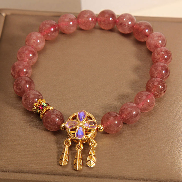 Braccialetto con ciondolo acchiappasogni a forma di quadrifoglio naturale con Buddha Stones e quarzo fragola