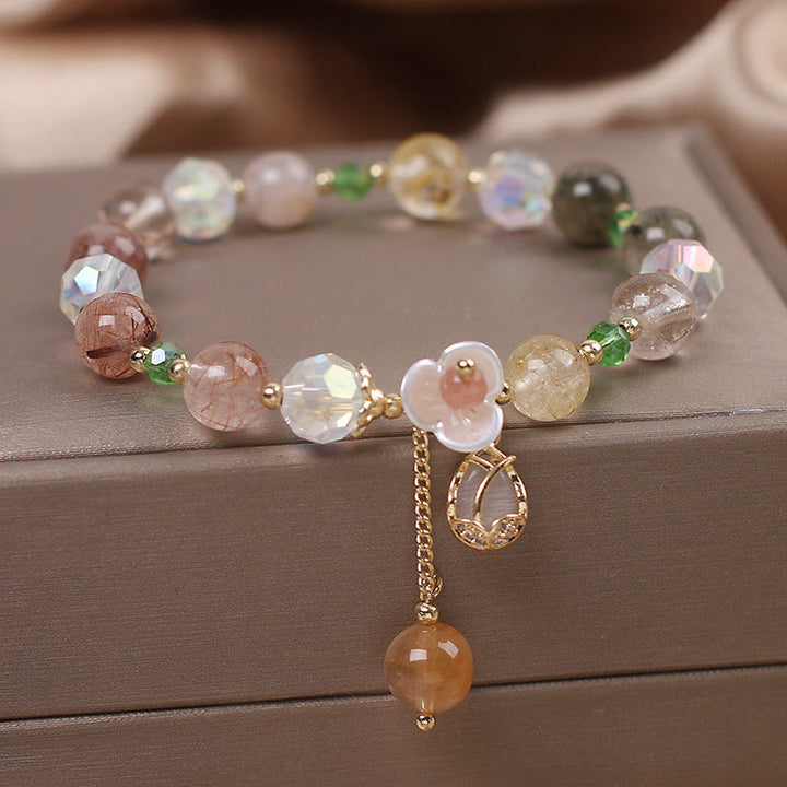 Braccialetto di guarigione con fiori di fluorite, quarzo fragola, quarzo rutilato Buddha Stones