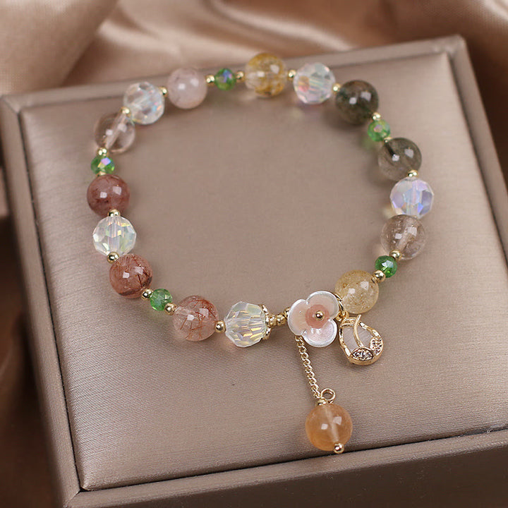 Braccialetto di guarigione con fiori di fluorite, quarzo fragola, quarzo rutilato Buddha Stones