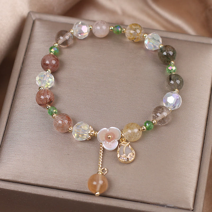 Braccialetto di guarigione con fiori di fluorite, quarzo fragola, quarzo rutilato Buddha Stones