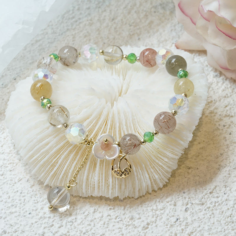 Braccialetto di guarigione con fiori di fluorite, quarzo fragola, quarzo rutilato Buddha Stones