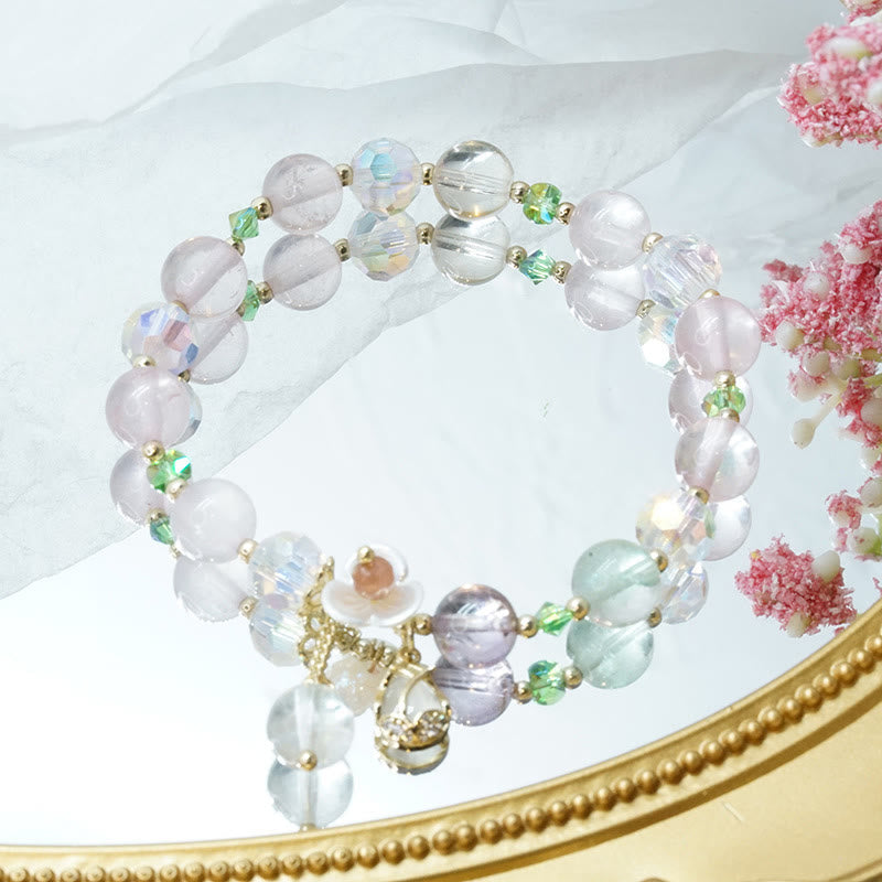 Braccialetto di guarigione con fiori di fluorite, quarzo fragola, quarzo rutilato Buddha Stones