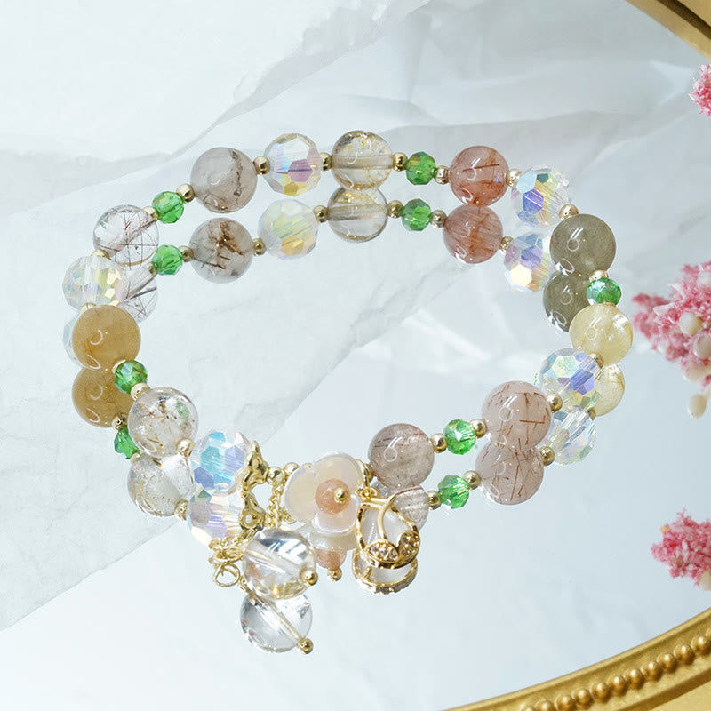 Braccialetto di guarigione con fiori di fluorite, quarzo fragola, quarzo rutilato Buddha Stones
