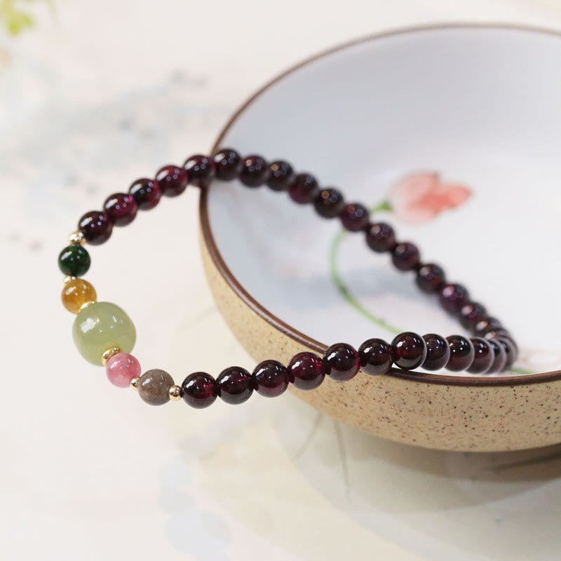 Braccialetto della passione con perline di giada e tormalina naturale di granato e Buddha Stones