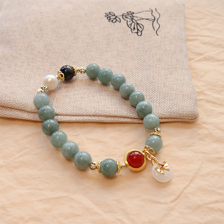 Braccialetto della fortuna con papillon in perle di agata rossa e giada naturale Buddha Stones