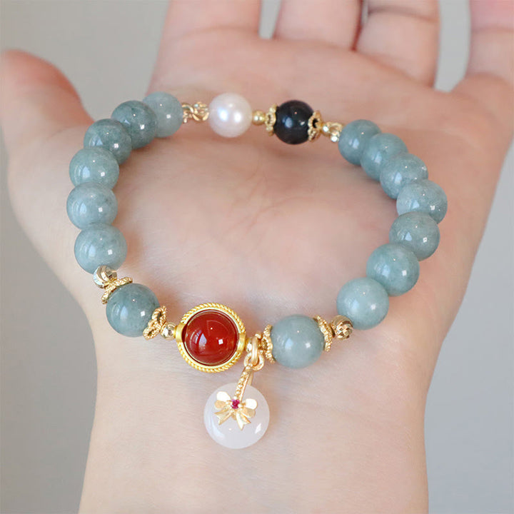 Braccialetto della fortuna con papillon in perle di agata rossa e giada naturale Buddha Stones