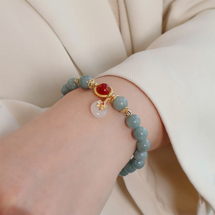 Braccialetto della fortuna con papillon in perle di agata rossa e giada naturale Buddha Stones