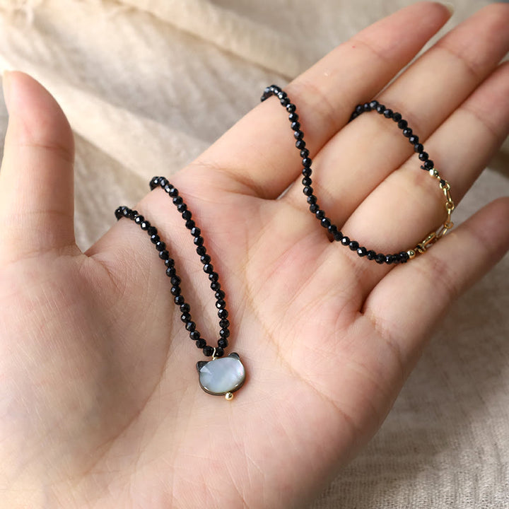 Collana girocollo con ciondolo a forma di gatto carino e spinello nero Buddha Stones - image 13