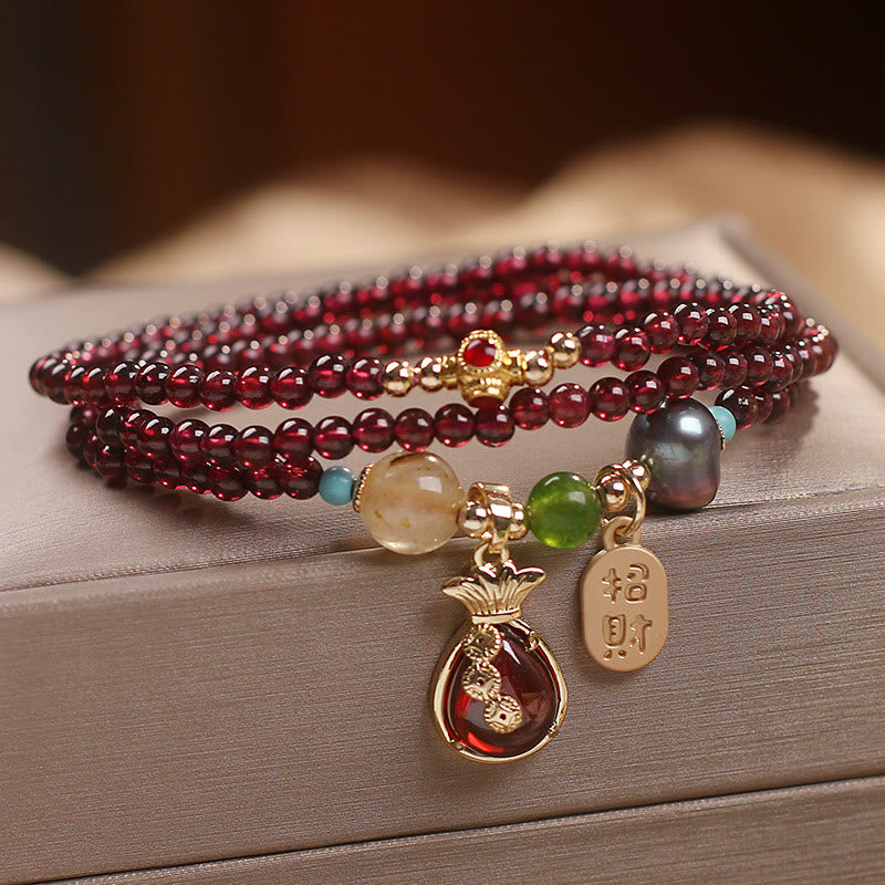 Braccialetto di protezione della ricchezza con monete di granato naturale multistrato in Buddha Stones giada