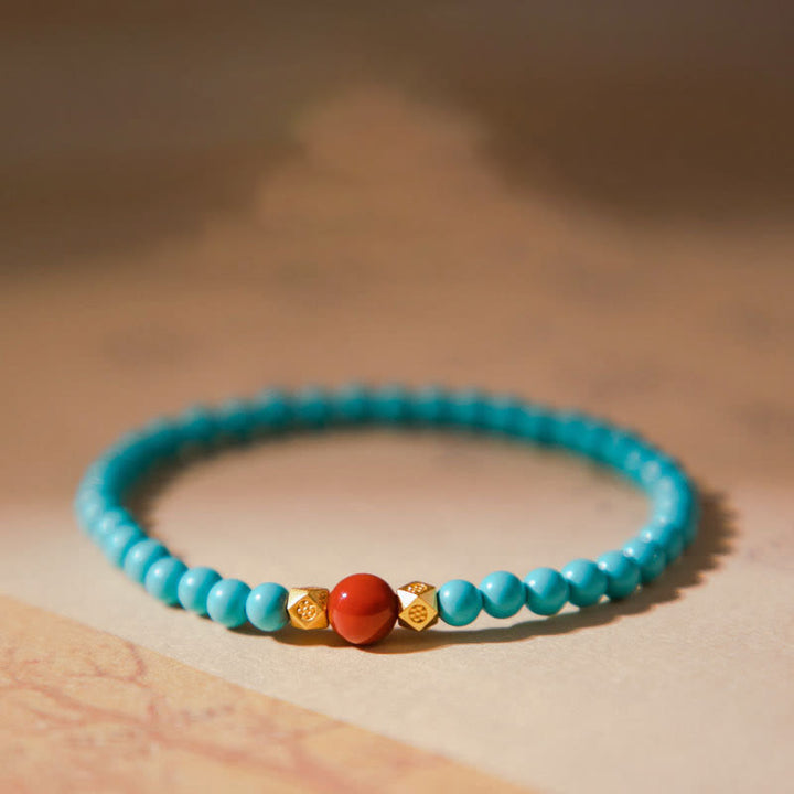 Braccialetto di protezione con perline di agata rossa e turchese Buddha Stones