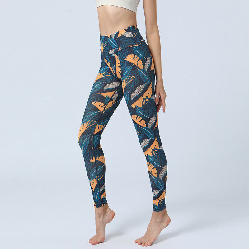 Leggings da yoga a vita alta con stampa Buddha Stones , per fitness e sport, da donna - Foglie arancioni e blu - US8-10, UK/AU12-14, EU40-42 (XL) - image 13