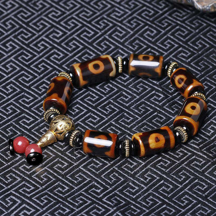 Braccialetto con ciondolo della fortuna con perline Dzi a nove occhi tibetani Buddha Stones