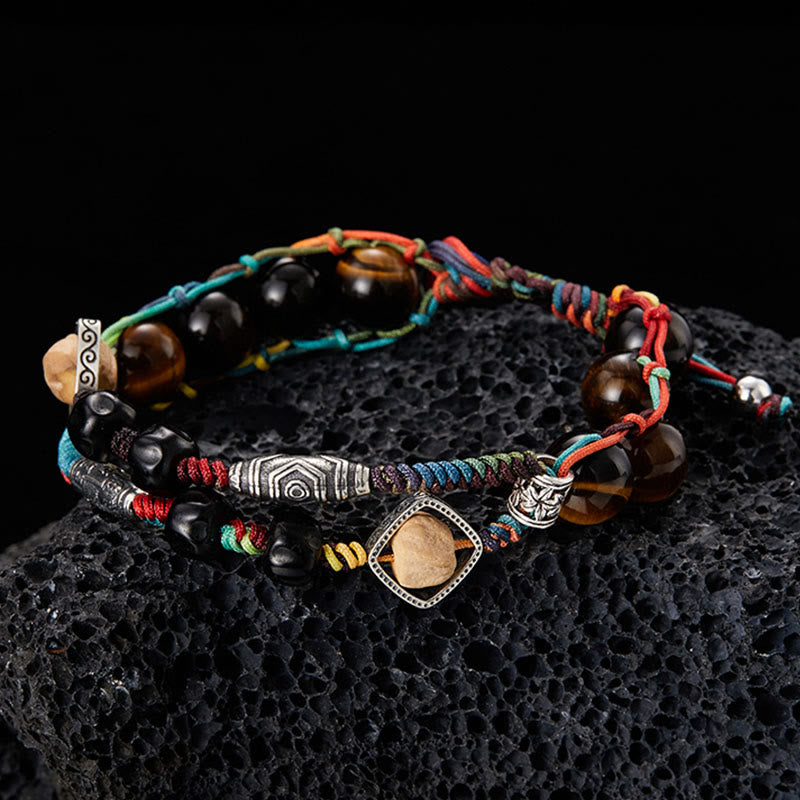 Braccialetto fatto a mano con coraggio Buddha Stones in argento sterling 925 con occhio di tigre e semi di Bodhi - image 1