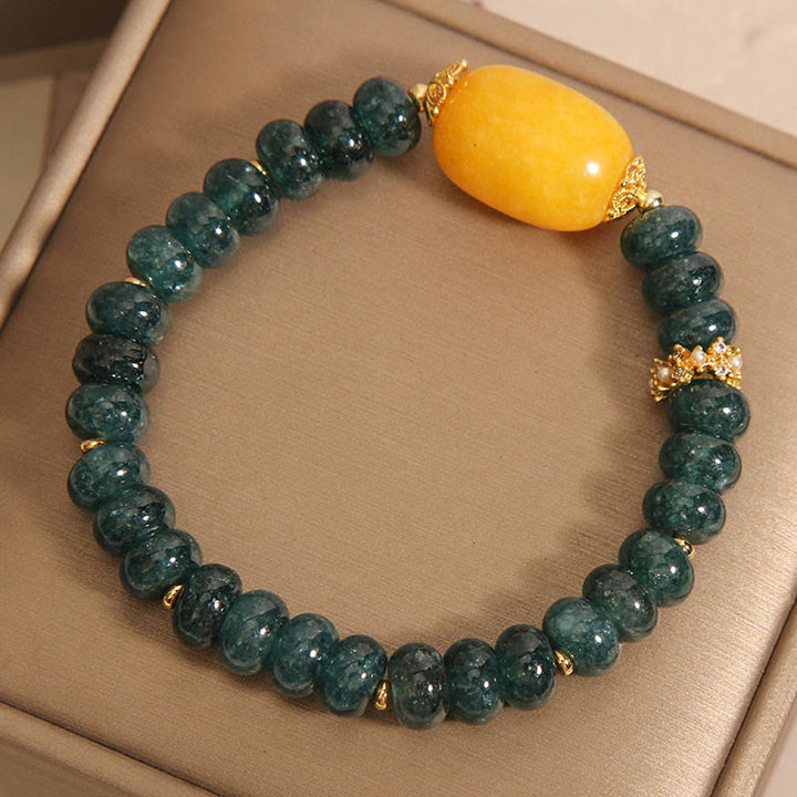 Braccialetto della fortuna con perline di abaco di giada verde Buddha Stones e topazio