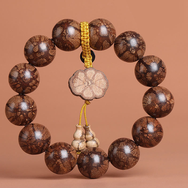 Bracciale Buddha Stones Plum Blossom Wood per la pace interiore