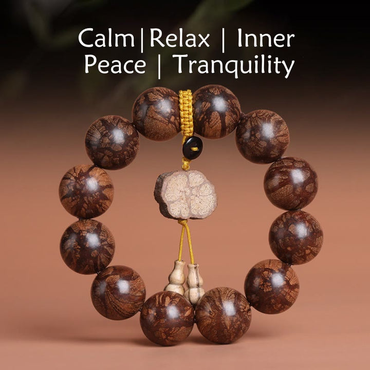 Bracciale Buddha Stones Plum Blossom Wood per la pace interiore