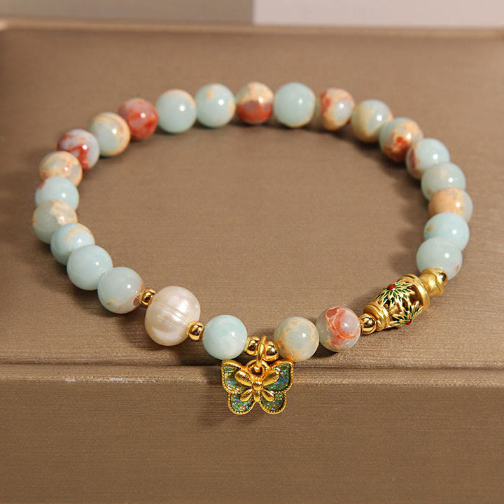 Braccialetto della ricchezza con farfalla di perle di pietra Shoushan Buddha Stones