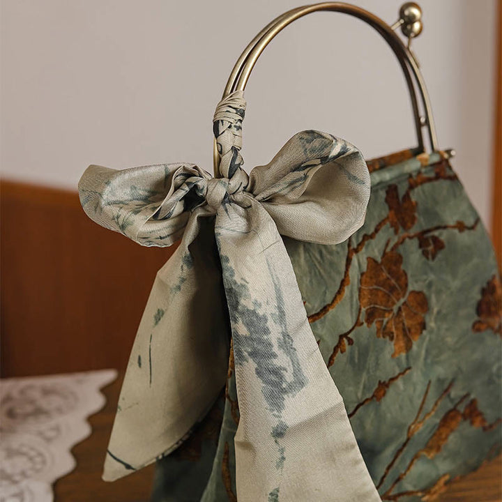 Borsa a tracolla in metallo con catena in velluto jacquard Buddha Stones