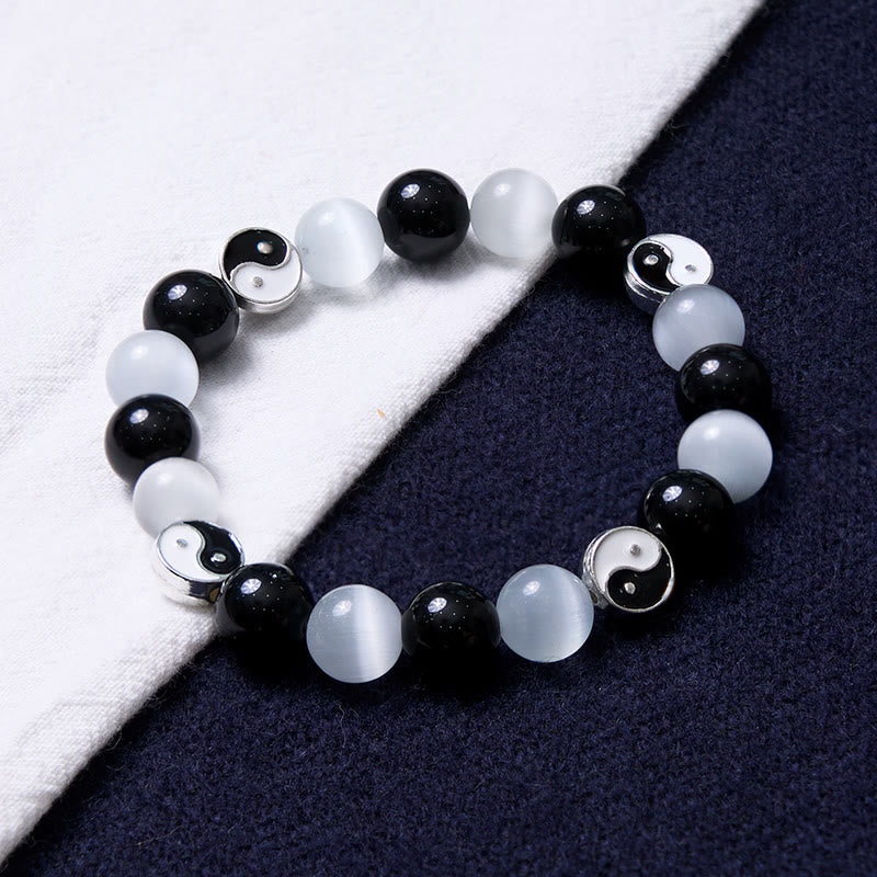 Braccialetto di forza purificatrice Yin Yang con occhio di gatto e ossidiana nera Buddha Stones
