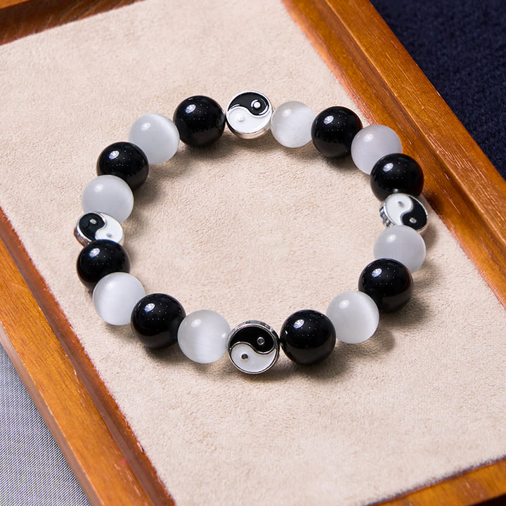 Braccialetto di forza purificatrice Yin Yang con occhio di gatto e ossidiana nera Buddha Stones