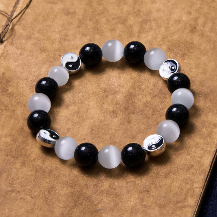 Braccialetto di forza purificatrice Yin Yang con occhio di gatto e ossidiana nera Buddha Stones