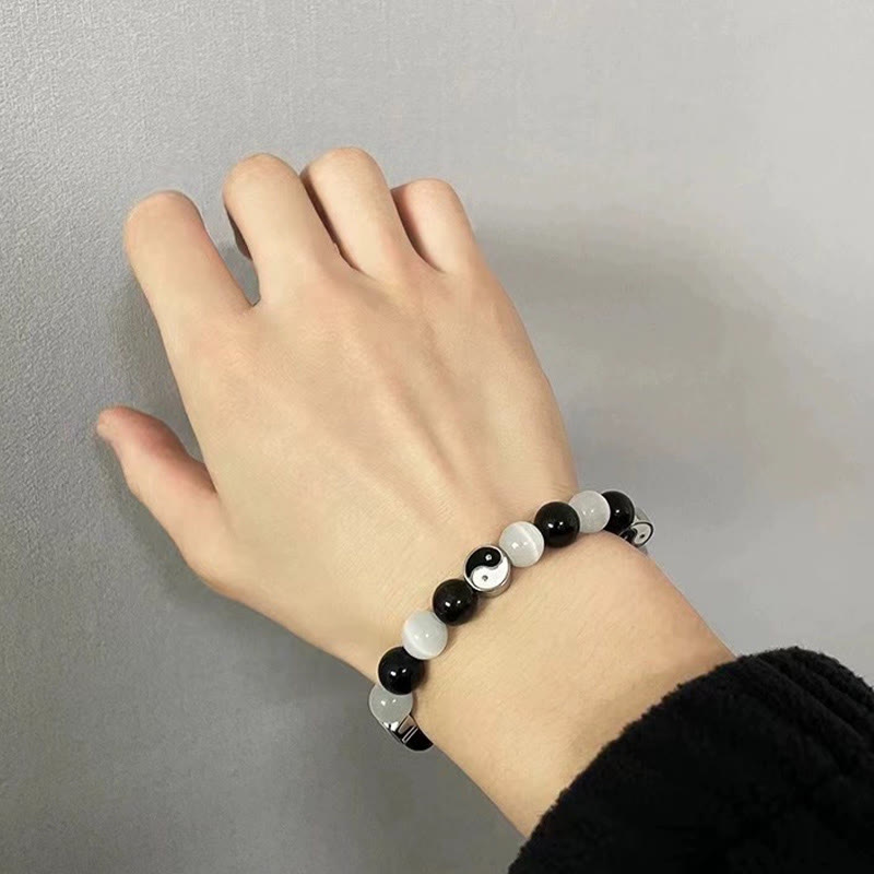 Braccialetto di forza purificatrice Yin Yang con occhio di gatto e ossidiana nera Buddha Stones