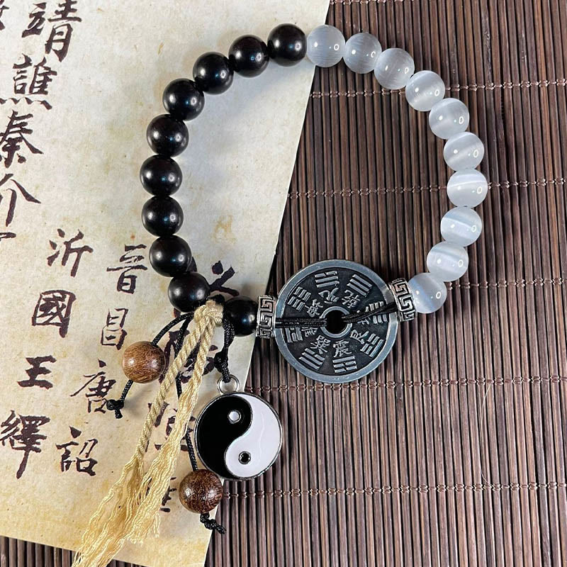 Braccialetto di corda di supporto per monete Bagua in legno di ebano con occhio di gatto Buddha Stones