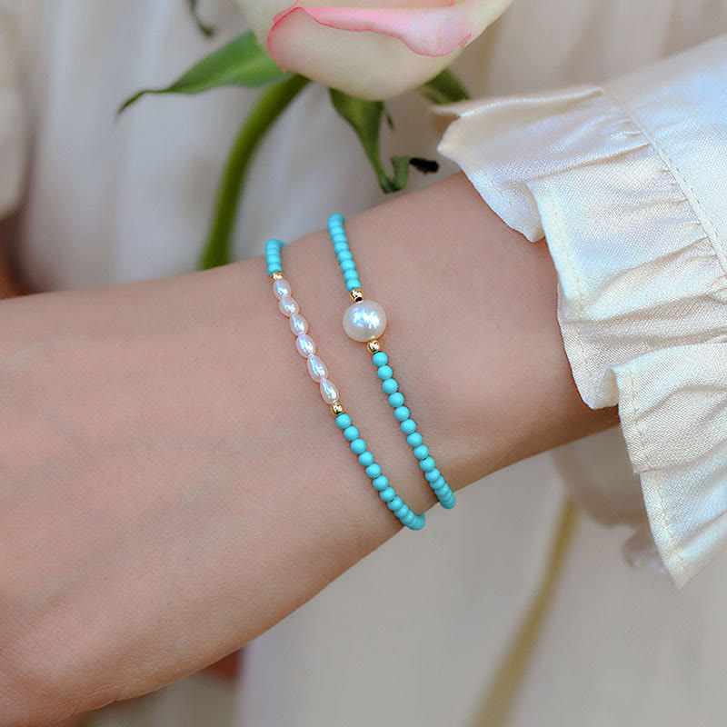 Braccialetto di protezione con piccole perle di agata rossa e turchese Buddha Stones