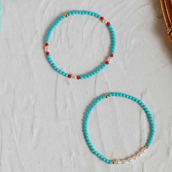 Braccialetto di protezione con piccole perle di agata rossa e turchese Buddha Stones