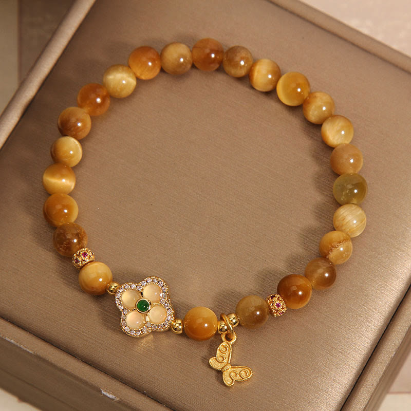 Braccialetto di protezione con farfalla a quadrifoglio e occhio di tigre Buddha Stones