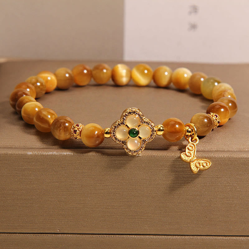 Braccialetto di protezione con farfalla a quadrifoglio e occhio di tigre Buddha Stones