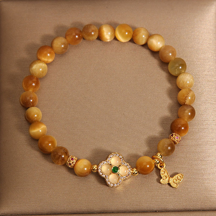 Braccialetto di protezione con farfalla a quadrifoglio e occhio di tigre Buddha Stones