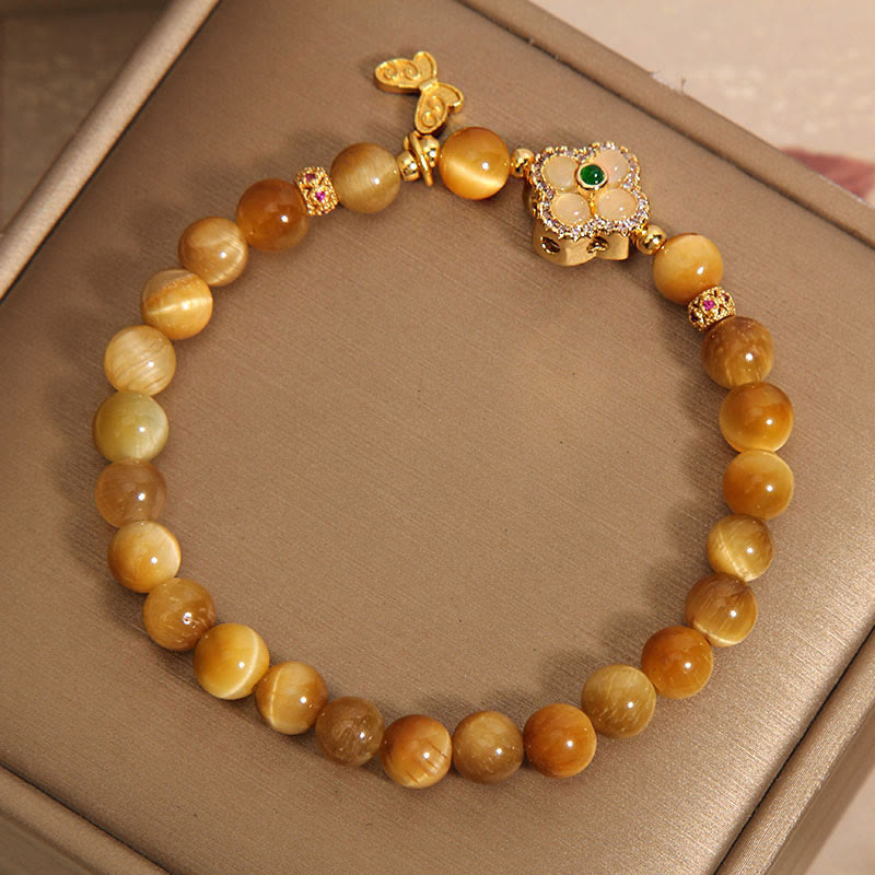 Braccialetto di protezione con farfalla a quadrifoglio e occhio di tigre Buddha Stones