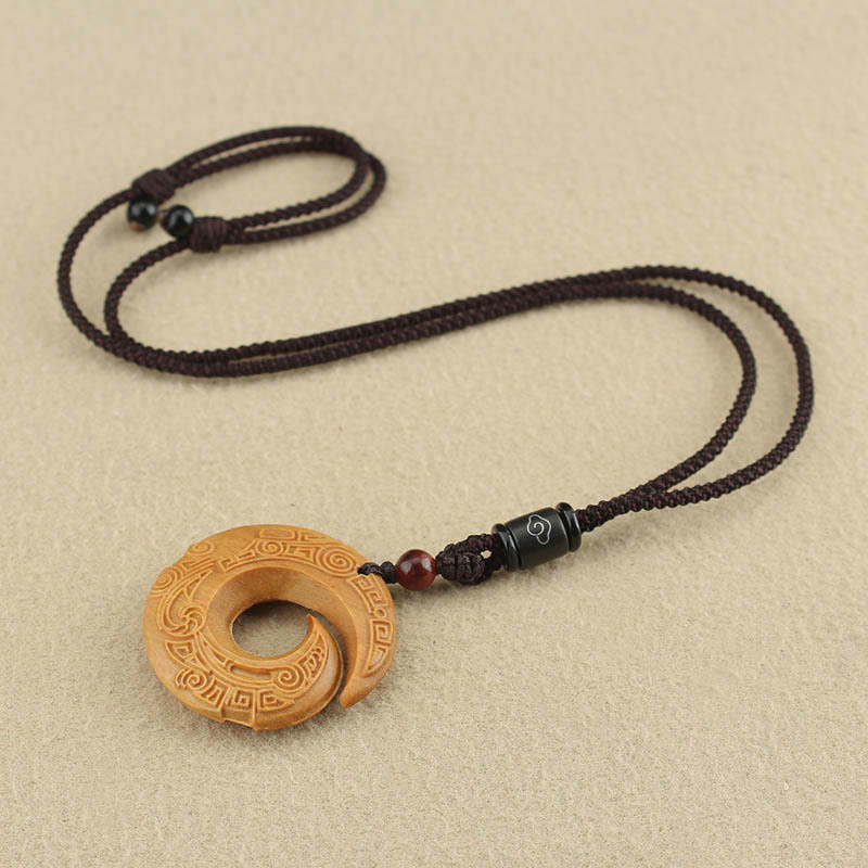 Buddha Stones Legno di ebano Sandalo La fortuna di una persona migliora Modello di design Collana con ciondolo di pace - image 16