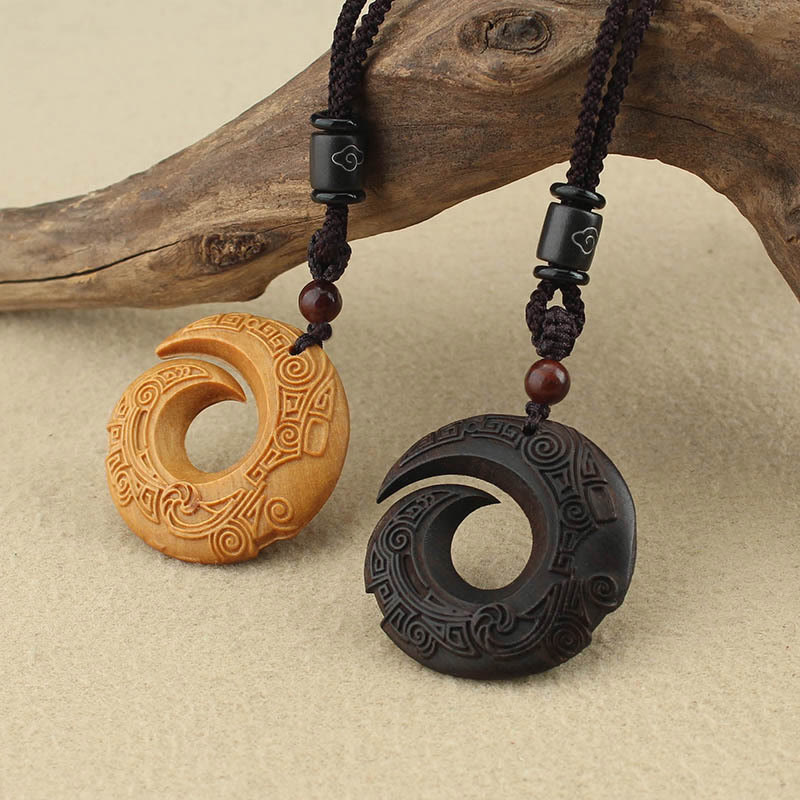 Buddha Stones Legno di ebano Sandalo La fortuna di una persona migliora Modello di design Collana con ciondolo di pace - image 1