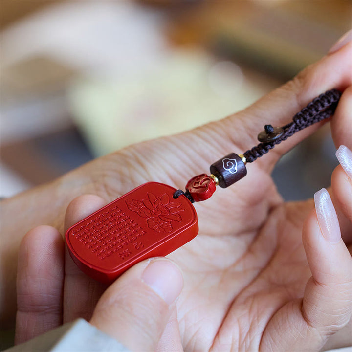 Portachiavi con benedizione del Sutra del cuore in cinabro naturale Buddha Stones
