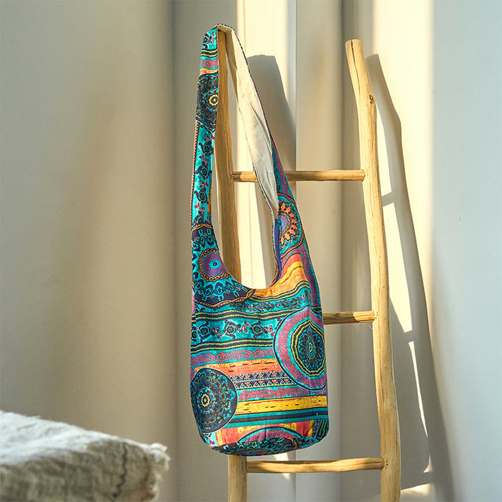 Borsa a tracolla in cotone con motivo a fiori blu Buddha Stones