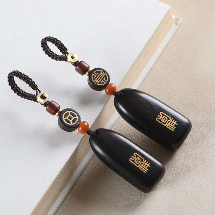 Buddha Stones Piccola foglia Sandalo rosso Legno di ebano Pace Auspicio Moneta di rame Protezione Portachiavi
