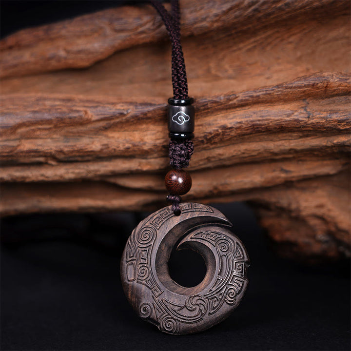 Buddha Stones Legno di ebano Sandalo La fortuna di una persona migliora Modello di design Collana con ciondolo di pace - image 2