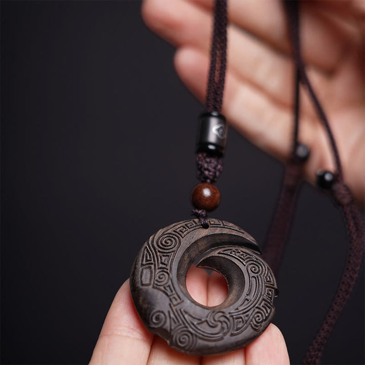 Buddha Stones Legno di ebano Sandalo La fortuna di una persona migliora Modello di design Collana con ciondolo di pace - image 4