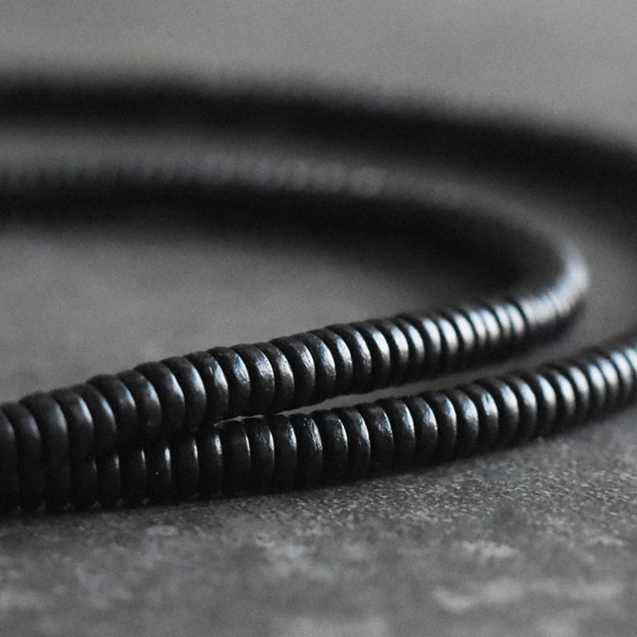 Bracciale multistrato in rame con perline di legno di ebano tibetano Buddha Stones