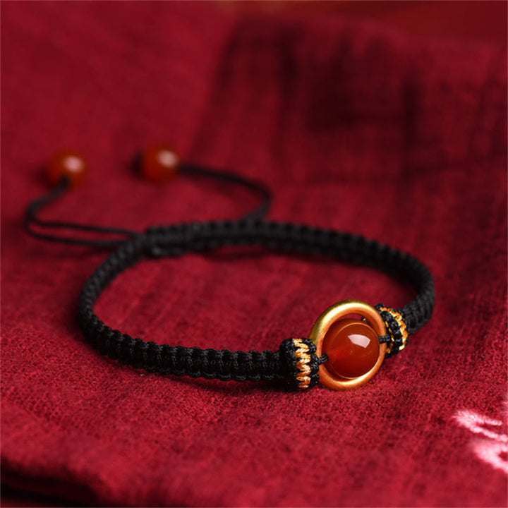 Braccialetto con corda calma e fibbia della pace con perline di agata rossa e Buddha Stones