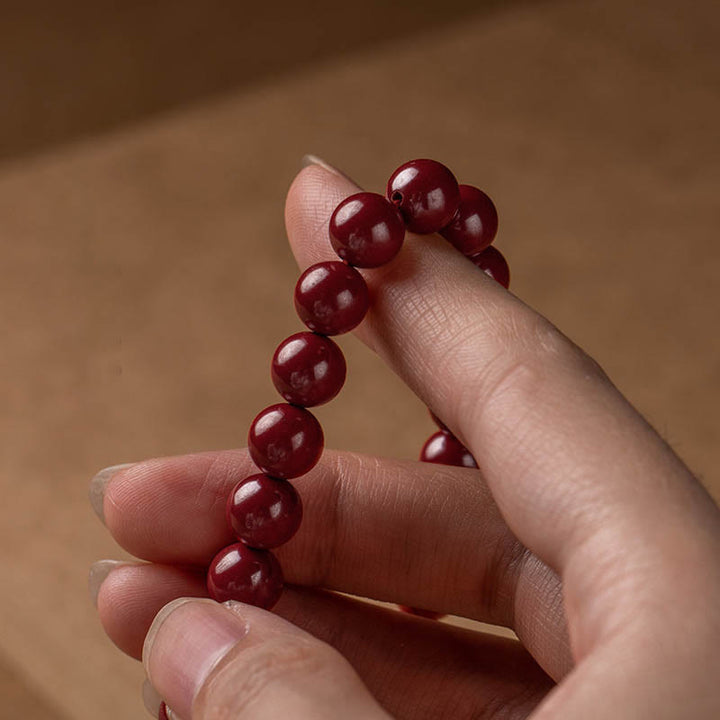 Braccialetto di benedizione del Sutra del cuore di cinabro naturale Buddha Stones