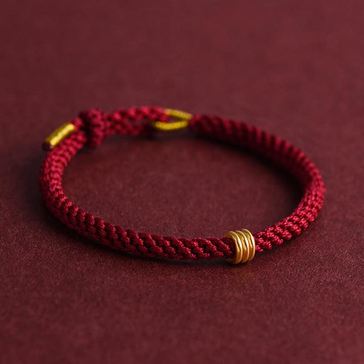Braccialetto in corda intrecciata con design a triplo anello in oro 999 Buddha Stones - image 2