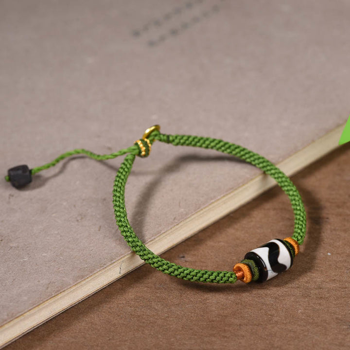 Braccialetto di corda verde intrecciata con perline tibetane Dzi fatte a mano di Buddha Stones
