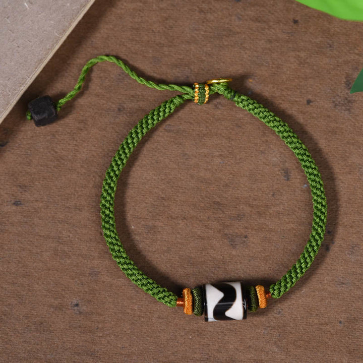 Braccialetto di corda verde intrecciata con perline tibetane Dzi fatte a mano di Buddha Stones