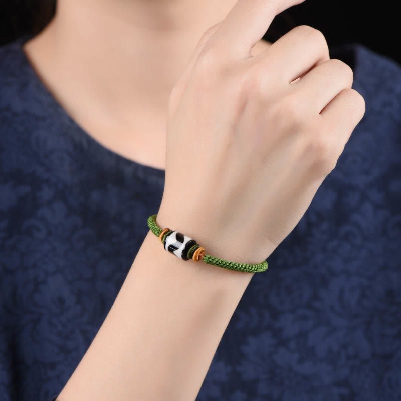 Braccialetto di corda verde intrecciata con perline tibetane Dzi fatte a mano di Buddha Stones
