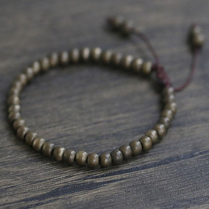 Bracciale semplice in ottone e rame con Buddha Stones, equilibrio e ricchezza